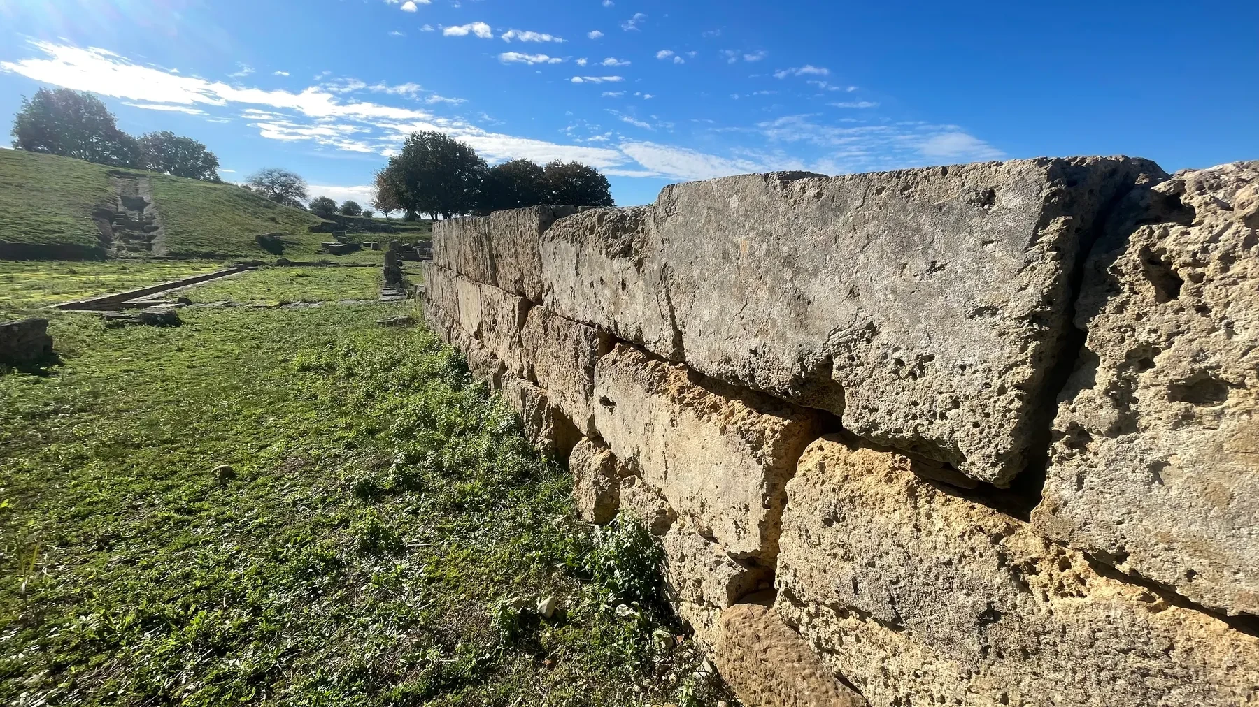 A weathered ancient stone wall at Ancient Elis