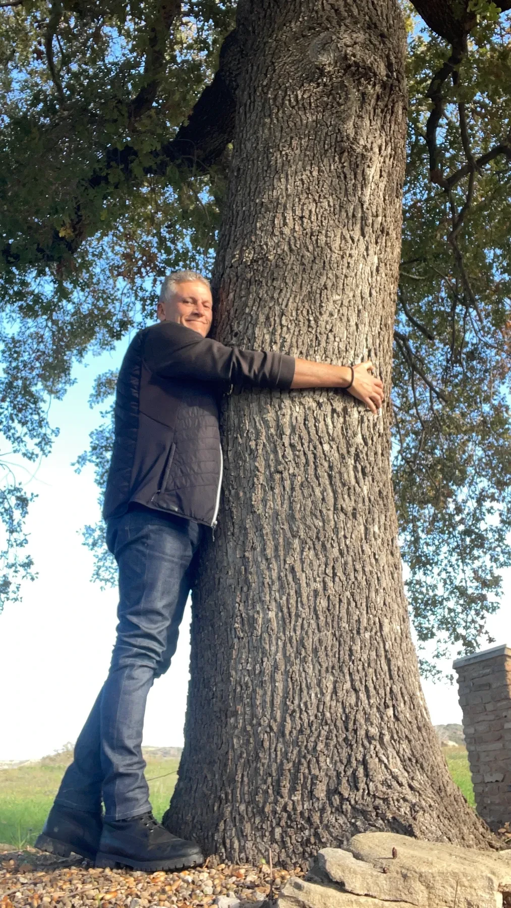 Κωνσταντίνος (Konstantinos) hugging a large tree at Ancient Elis, home of the Olympic Games