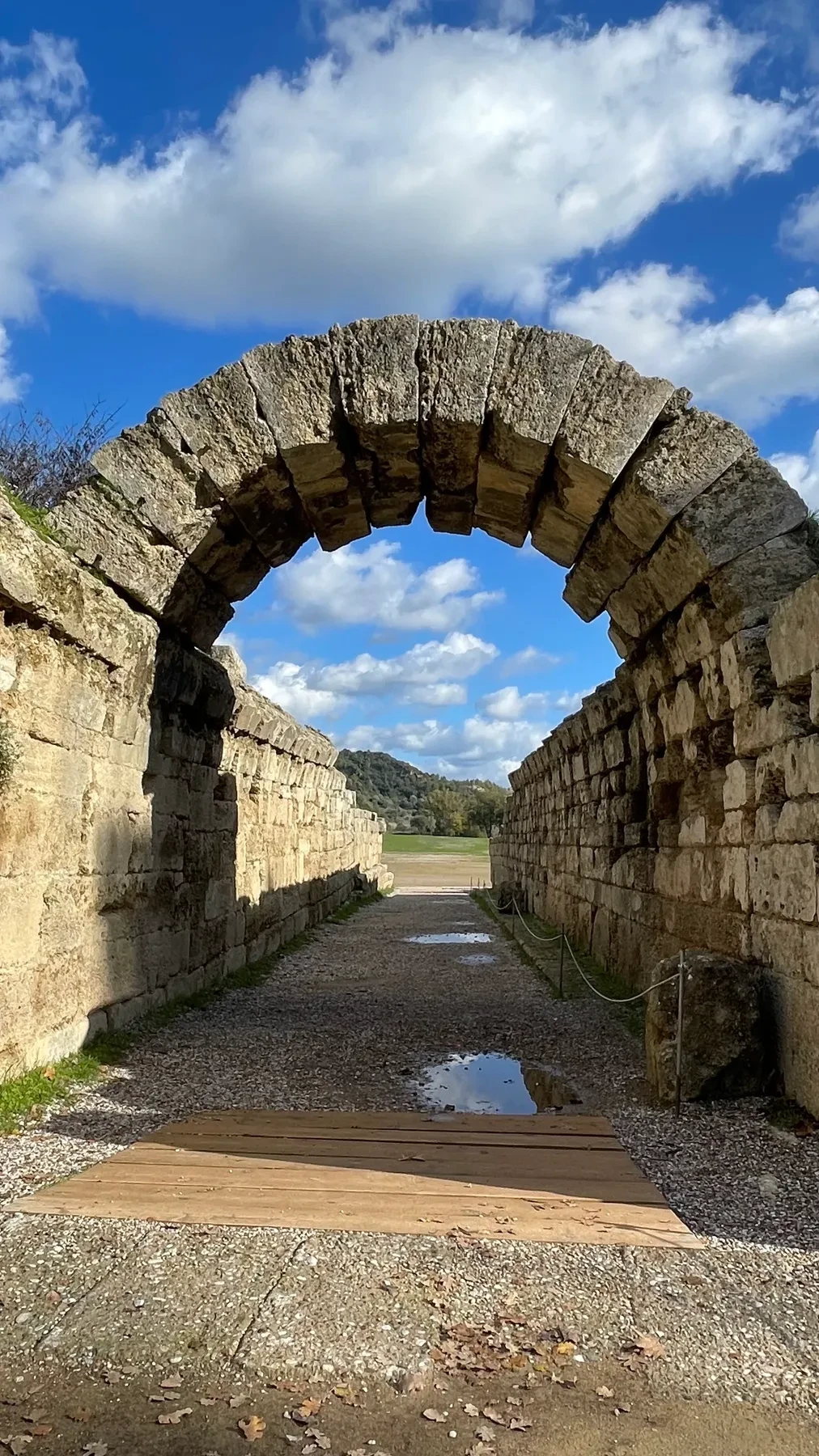 The stone archway entrance into the ancient stadium at Olympia