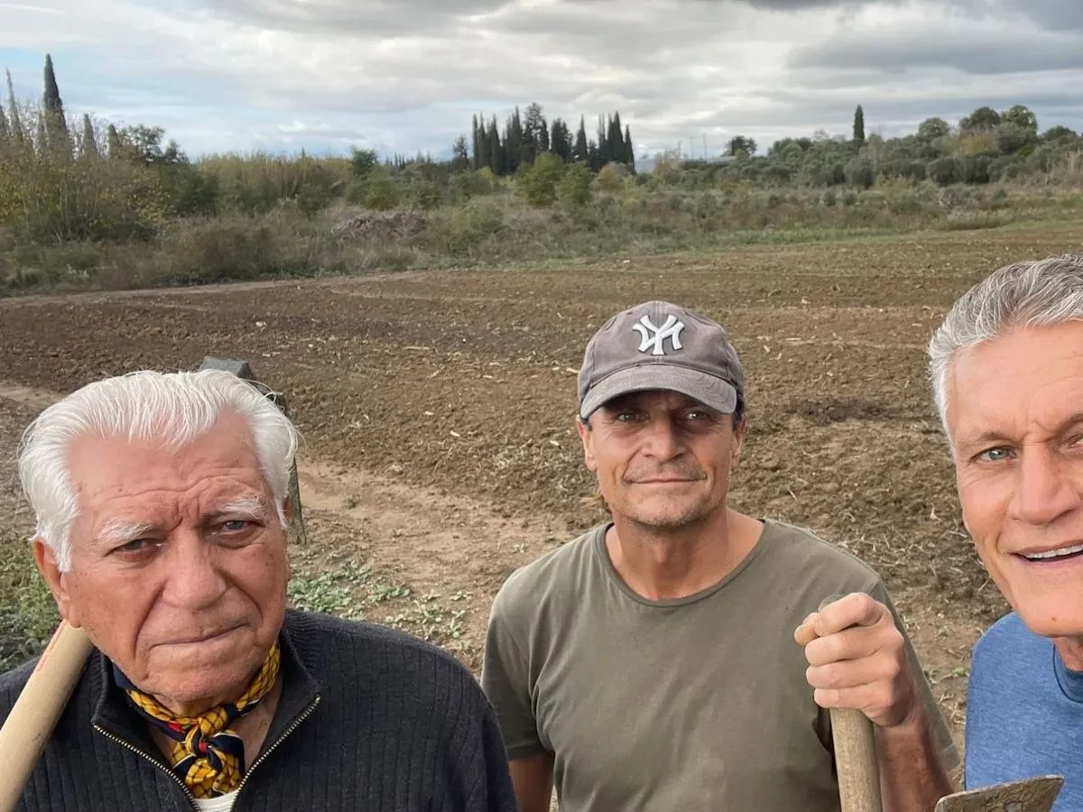 Ευάγγελος (Angelo) with his sons Κωνσταντίνος (Konstantinos) and Αλέξανδρος (Alexandros), planting new olive trees together
